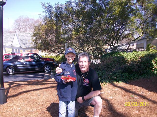 Ex-President Greg Tobin visits with Honorary Firefighter Patrick Chance.  March, 2011.